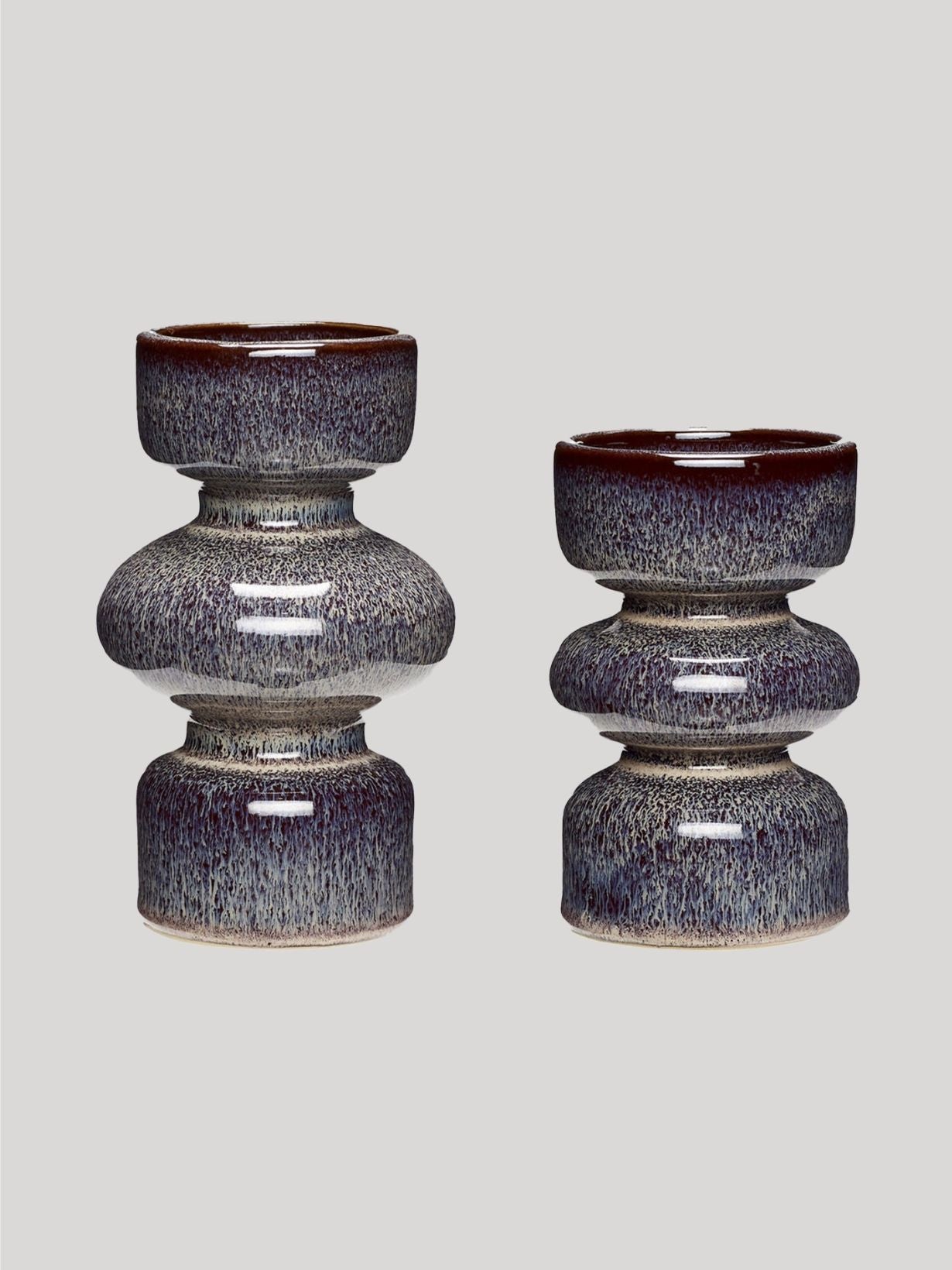 Lot de deux bougeoirs en céramique, Aage