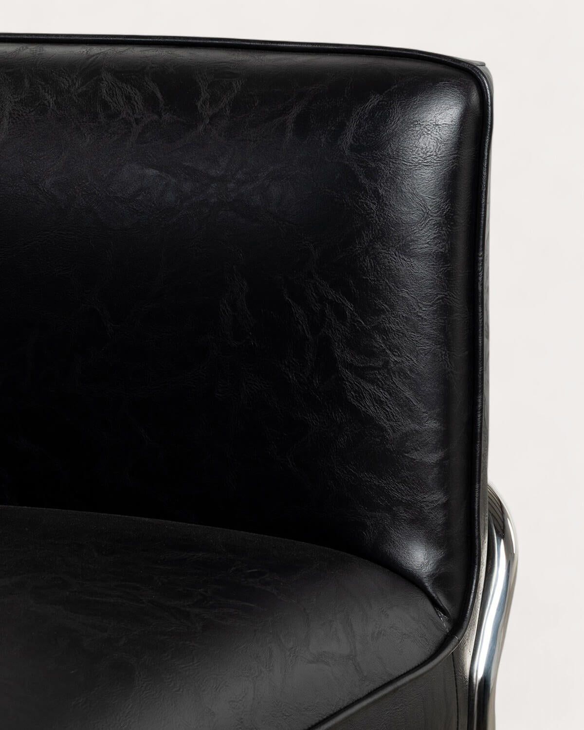 Fauteuil en similicuir et métal Marcellus